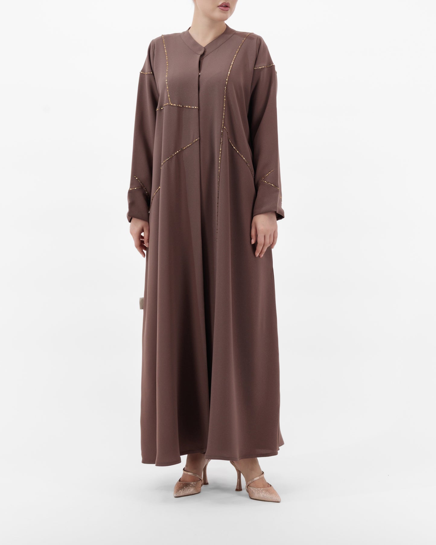 Brown long dress worn by a model on a white background