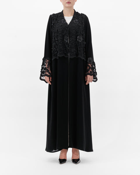 Black lace abaya on a white background