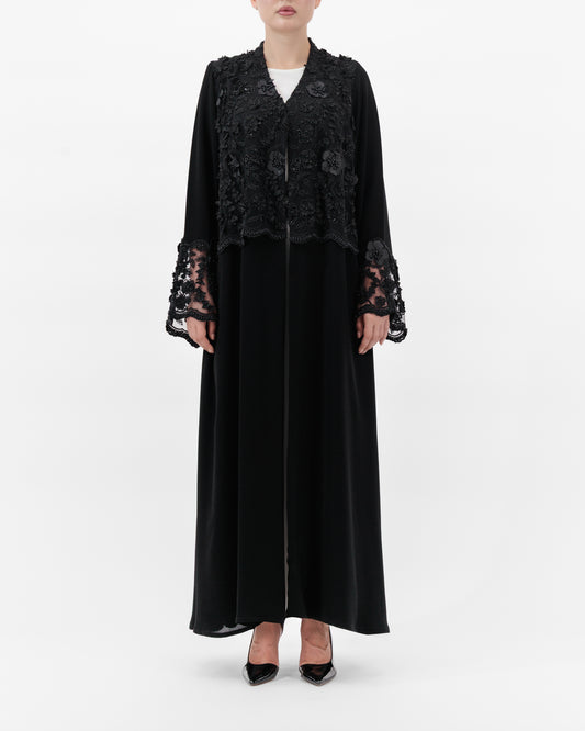 Black lace abaya on a white background