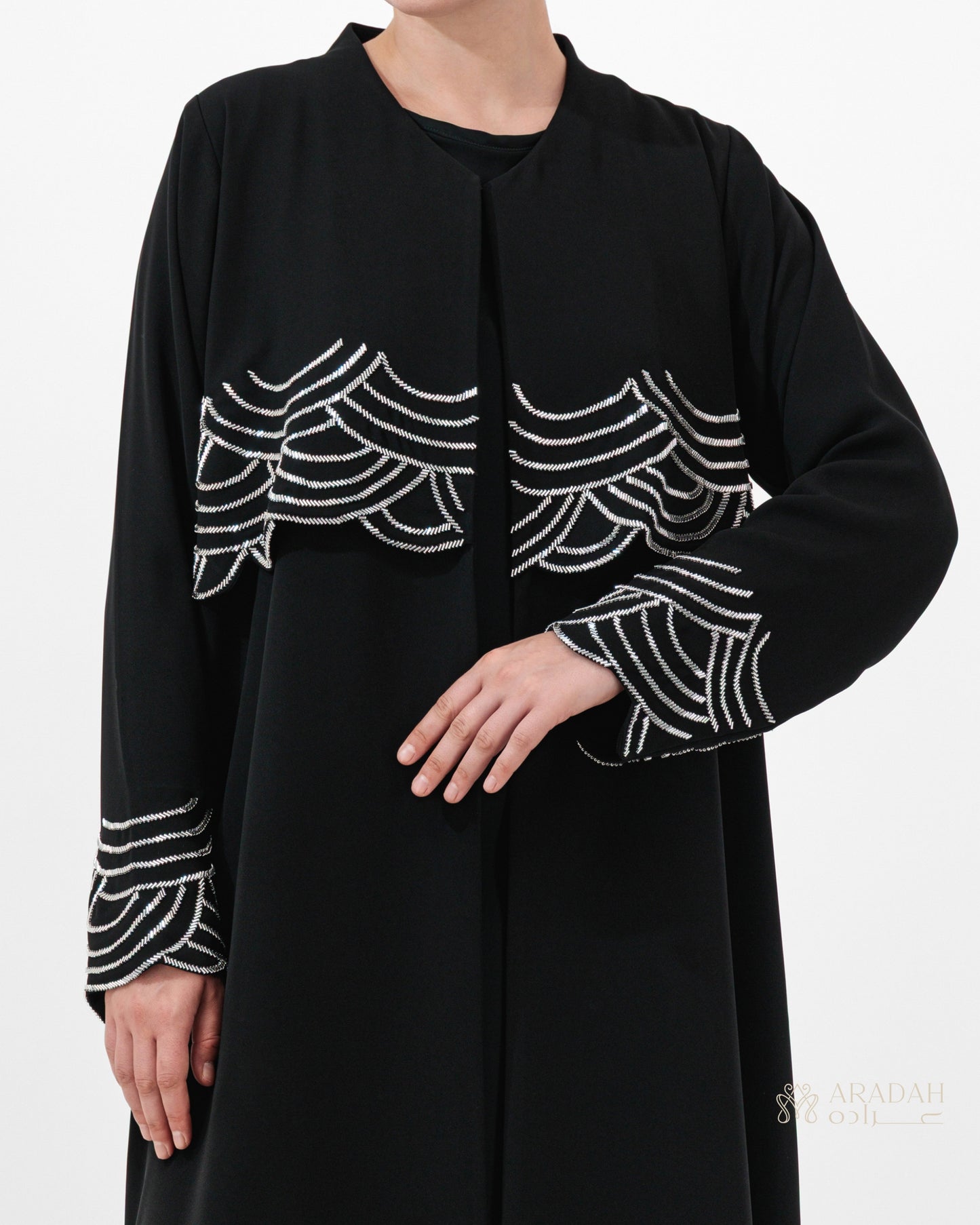 Regalia abaya by Aradah — Nidha — black — front view

