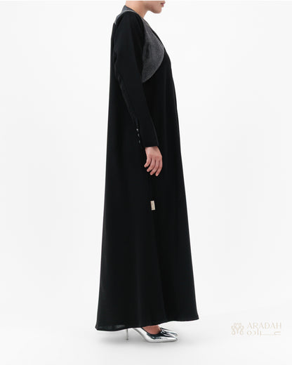 Black long dress with a gray top on a white background