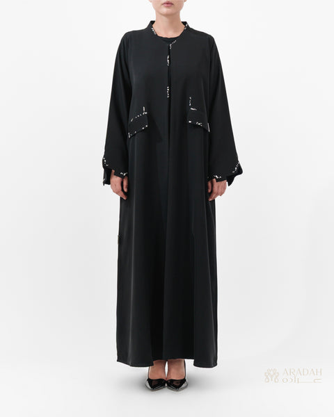 Scattered Silence abaya by Aradah — Nidha fabric — black — front view

