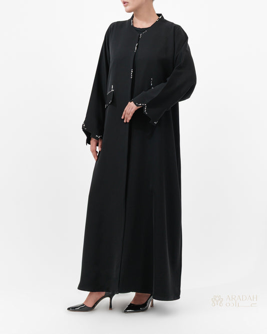 Scattered Silence abaya — Nidha — black — side profile

