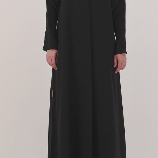 Rush Hour abaya — metallic woven lines panel — close detail

