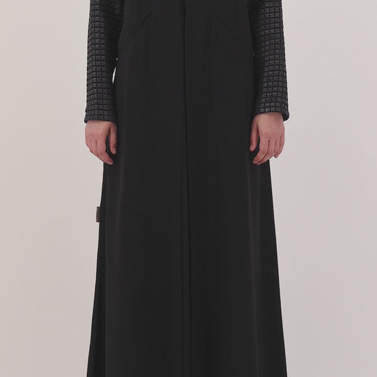 Grid Noir abaya — limited-edition leather grids — close detail

