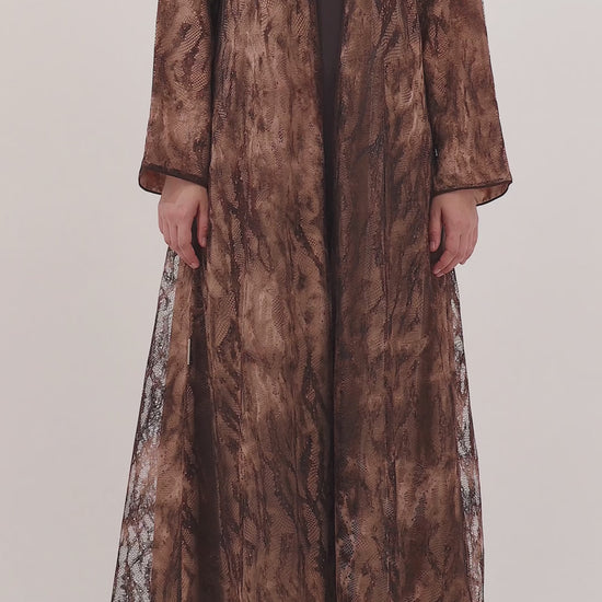 Sahara abaya — camo-inspired animal lace texture — close detail

