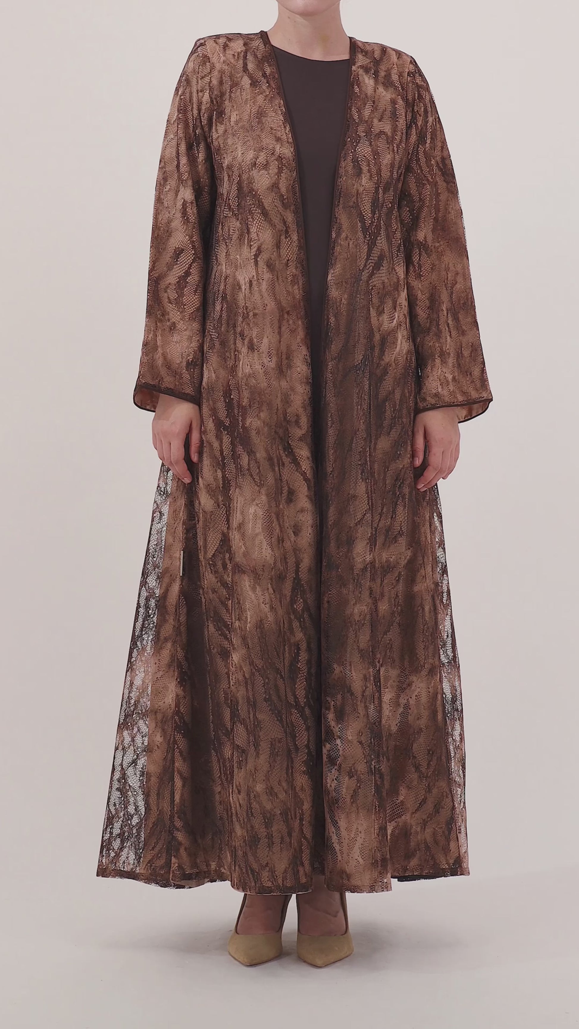 Sahara abaya — camo-inspired animal lace texture — close detail


